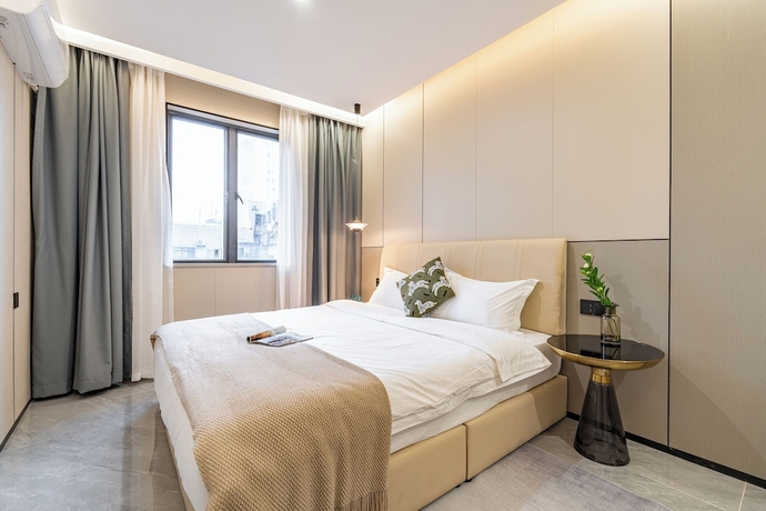 Imagen de la habitación del Hotel Xiangwang Meisu. Foto 14