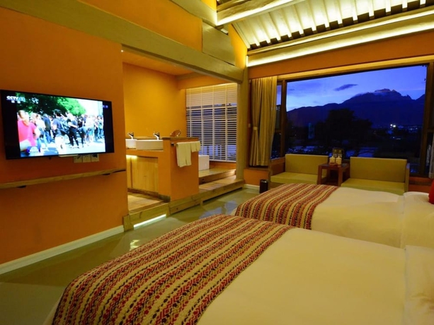 Imagen de la habitación del Hotel Xianyun Xiyue Boutique Holiday Hotel. Foto 9