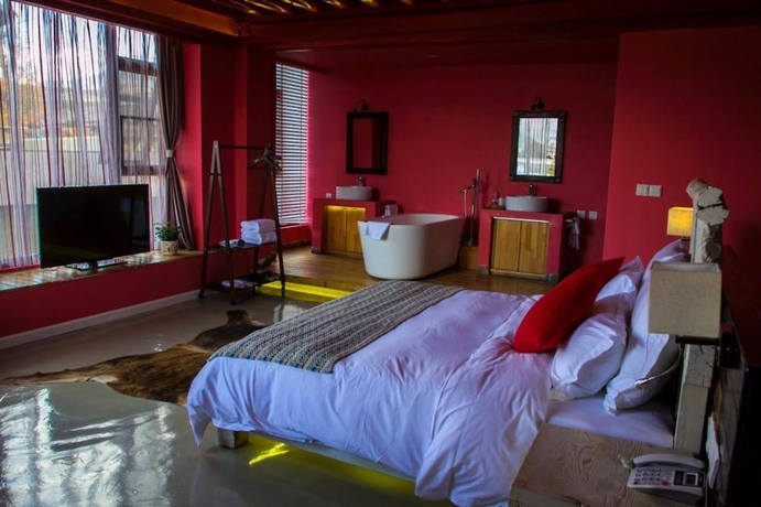 Imagen de la habitación del Hotel Xianyun Xiyue Boutique Holiday Hotel. Foto 12