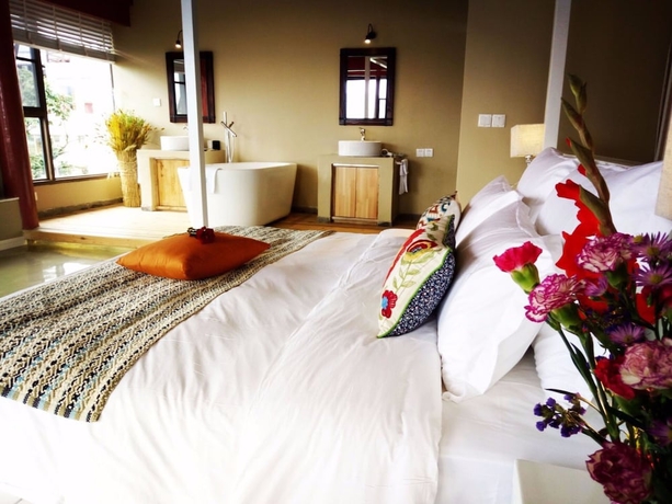 Imagen de la habitación del Hotel Xianyun Xiyue Boutique Holiday Hotel. Foto 13