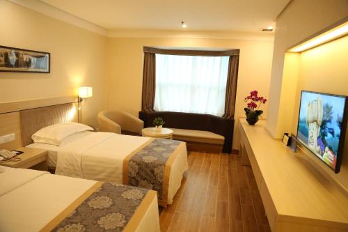 Imagen de la habitación del Hotel Xiao Xiang. Foto 6