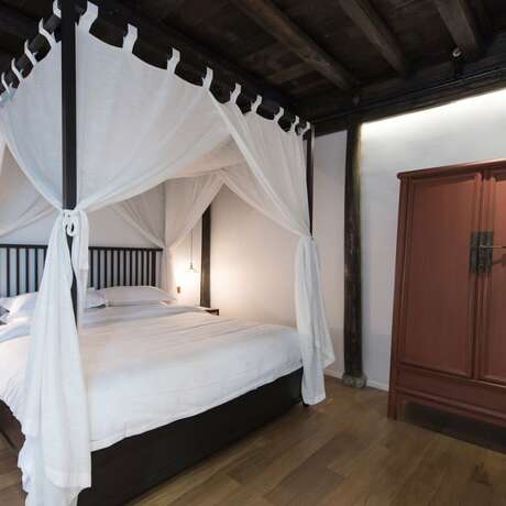 Imagen general del Hotel Xiaochaguniang Minsu. Foto 4