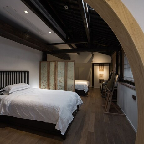 Imagen general del Hotel Xiaochaguniang Minsu. Foto 7