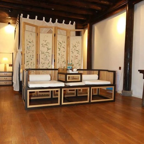 Imagen de la habitación del Hotel Xiaochaguniang Minsu. Foto 16