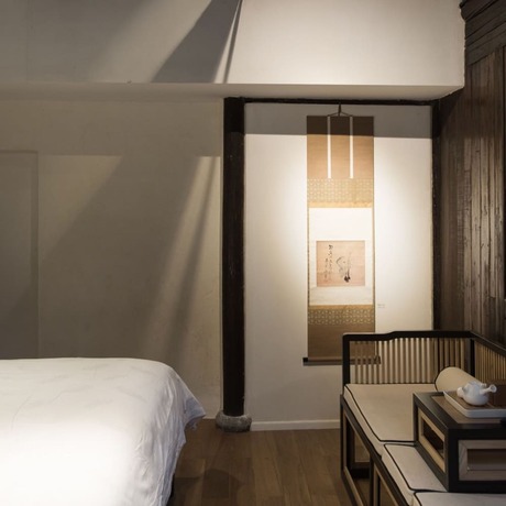 Imagen de la habitación del Hotel Xiaochaguniang Minsu. Foto 25