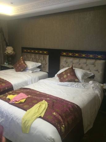 Imagen de la habitación del Hotel Xichang Cloizon Hotel. Foto 11