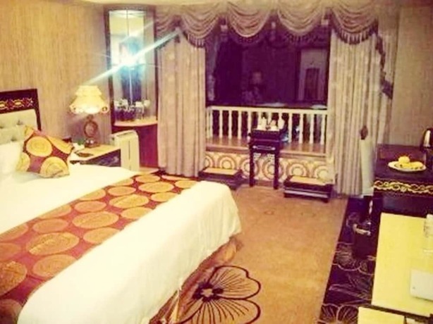 Imagen de la habitación del Hotel Xichang Cloizon Hotel. Foto 12