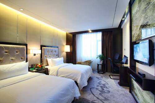 Imagen de la habitación del Hotel Xichang Minshan. Foto 4