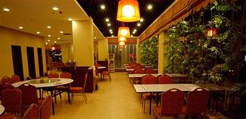 Imagen del bar/restaurante del Hotel Xierdun &agrave; Sweet Family Garden. Foto 5