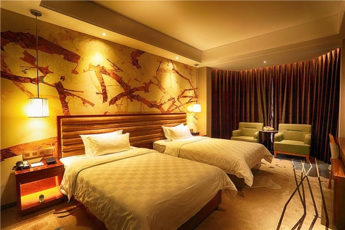 Imagen de la habitación del Hotel Xige Garden. Foto 3