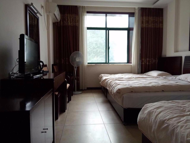 Imagen de la habitación del Hotel Xigu Resort Huangshan. Foto 6