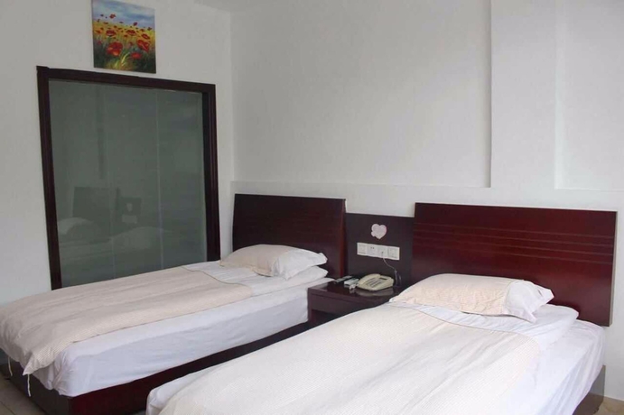 Imagen de la habitación del Hotel Xigu Resort Huangshan. Foto 7