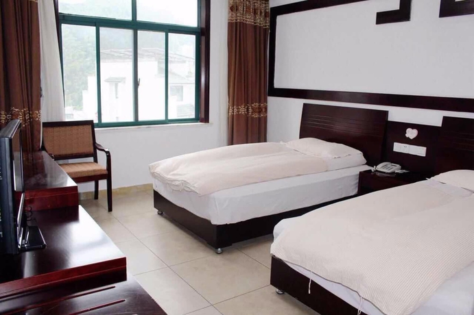 Imagen de la habitación del Hotel Xigu Resort Huangshan. Foto 14
