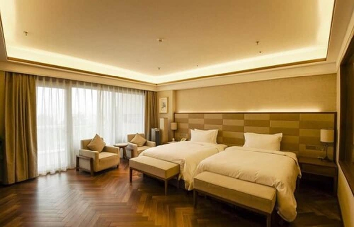 Imagen de la habitación del Hotel Xihai Holiday. Foto 6