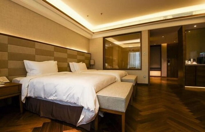 Imagen de la habitación del Hotel Xihai Holiday. Foto 7