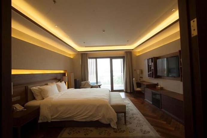 Imagen de la habitación del Hotel Xihai Holiday. Foto 8