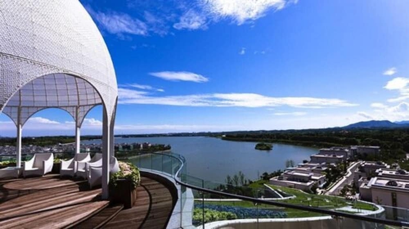 Imagen de los exteriores del Hotel Xihai Holiday. Foto 12