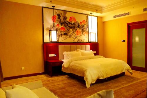 Imagen de la habitación del Hotel Xiing Xixin Spring. Foto 9