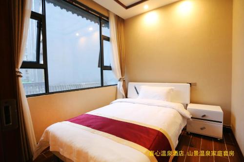 Imagen general del Hotel Xiing Xixin Spring. Foto 4