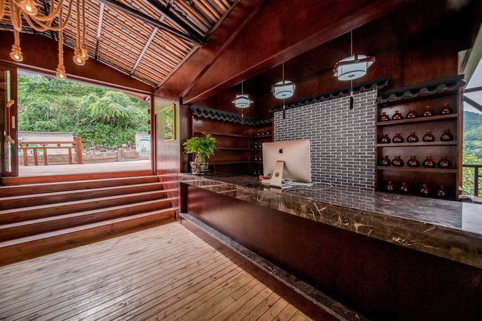 Imagen de los interiores del Hotel Xijiang Village Vision. Foto 20