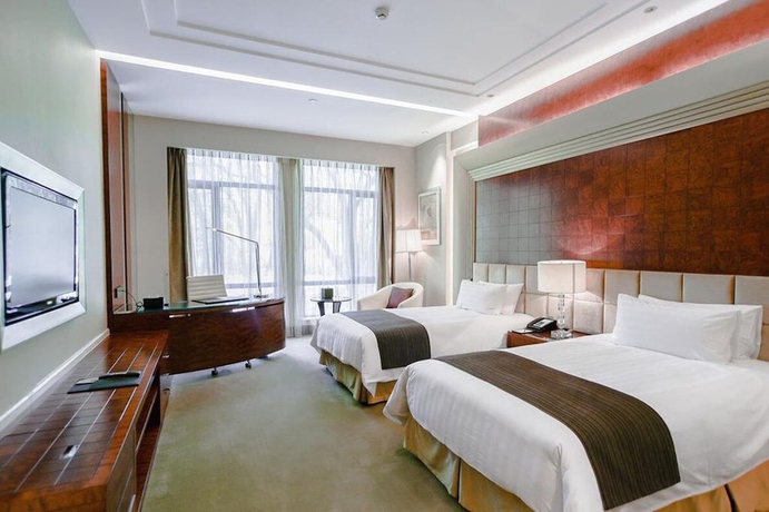 Imagen de la habitación del Hotel Xijiao State Guest. Foto 16