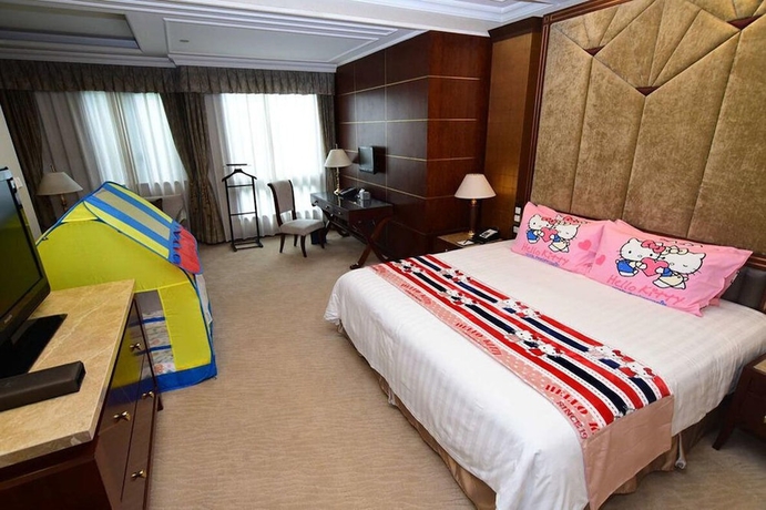 Imagen de la habitación del Hotel Xijiao State Guest. Foto 17
