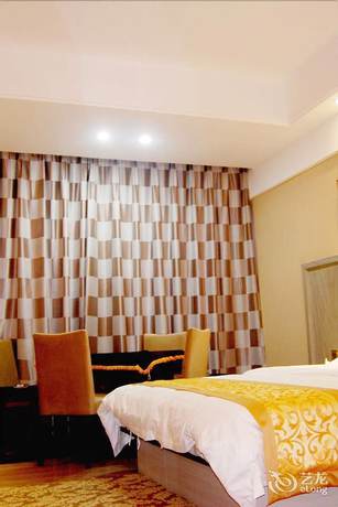 Imagen de la habitación del Hotel Xilaike Business Hotel- Xianning. Foto 10