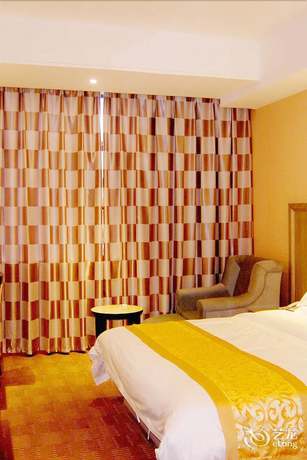 Imagen de la habitación del Hotel Xilaike Business Hotel- Xianning. Foto 11