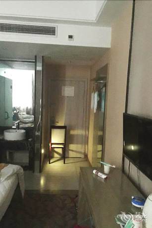 Imagen de la habitación del Hotel Xilaike Business Hotel- Xianning. Foto 15