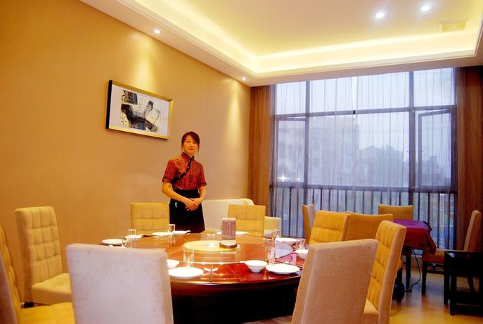 Imagen del bar/restaurante del Hotel Xilaike Business Hotel- Xianning. Foto 3