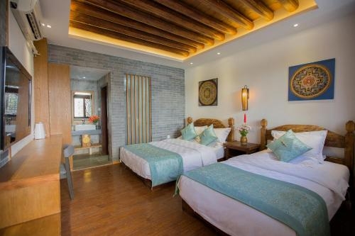 Imagen de la habitación del Hotel Xilu Xiaoxie Inn. Foto 9
