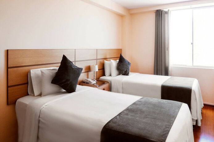 Imagen de la habitación del Hotel Xima Central Tacna. Foto 19