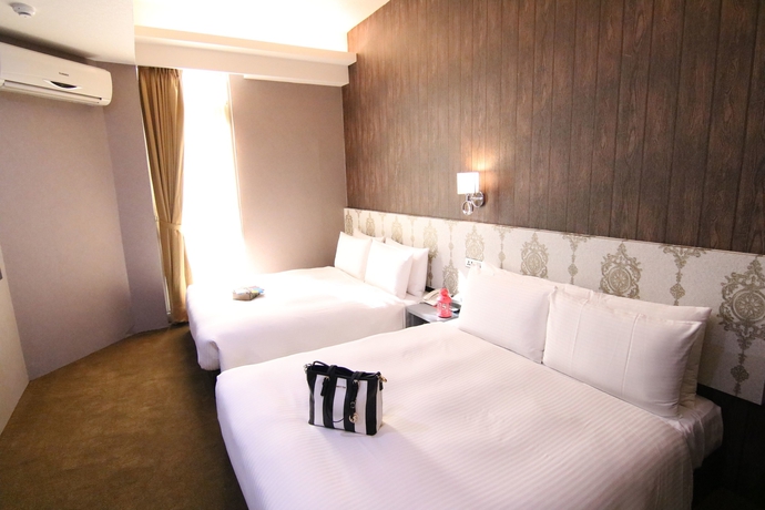 Imagen de la habitación del Hotel Ximen 101-s. Foto 3