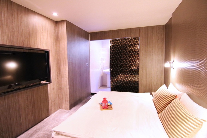Imagen de la habitación del Hotel Ximen 101-s. Foto 4