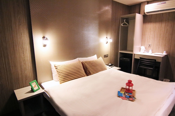 Imagen de la habitación del Hotel Ximen 101-s. Foto 5