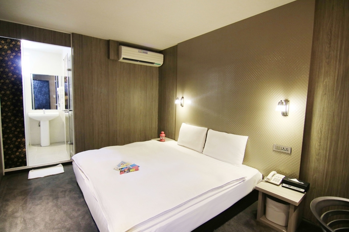 Imagen de la habitación del Hotel Ximen 101-s. Foto 6