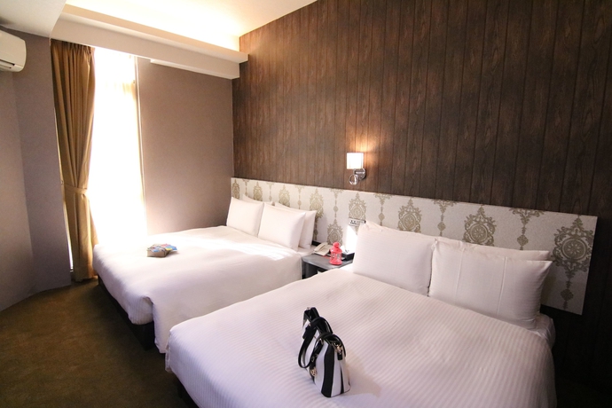 Imagen de la habitación del Hotel Ximen 101-s. Foto 7
