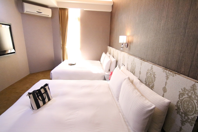 Imagen de la habitación del Hotel Ximen 101-s. Foto 8