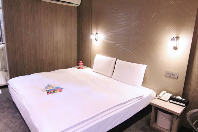 Imagen de la habitación del Hotel Ximen 101-s. Foto 9