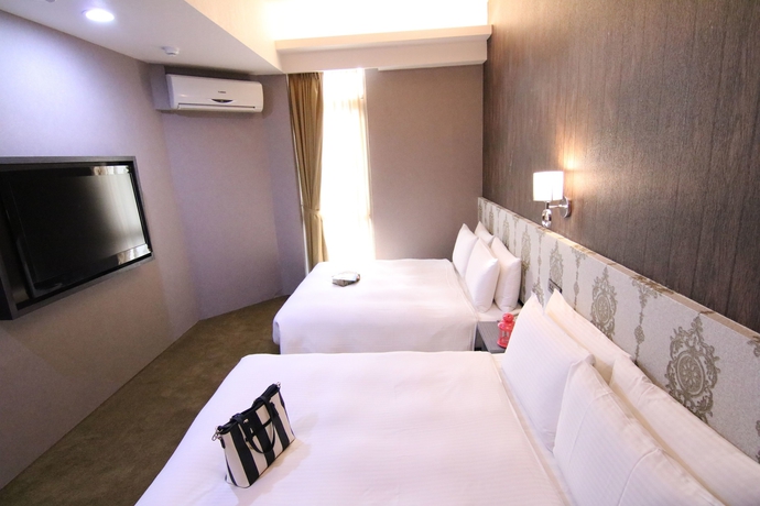 Imagen de la habitación del Hotel Ximen 101-s. Foto 10