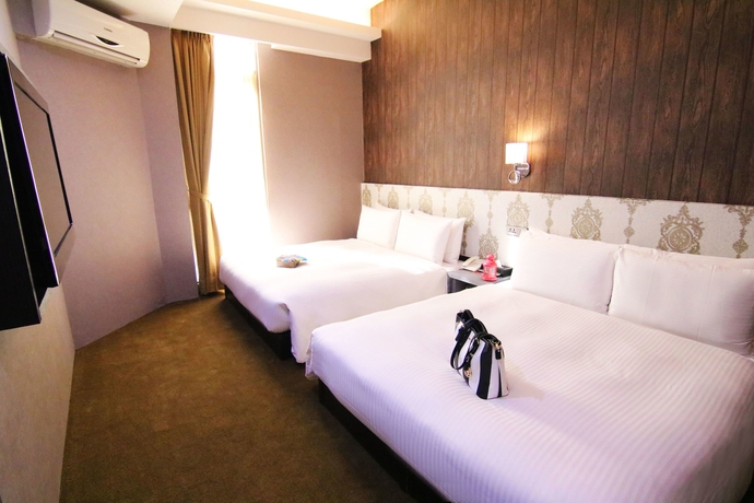 Imagen de la habitación del Hotel Ximen 101-s. Foto 12