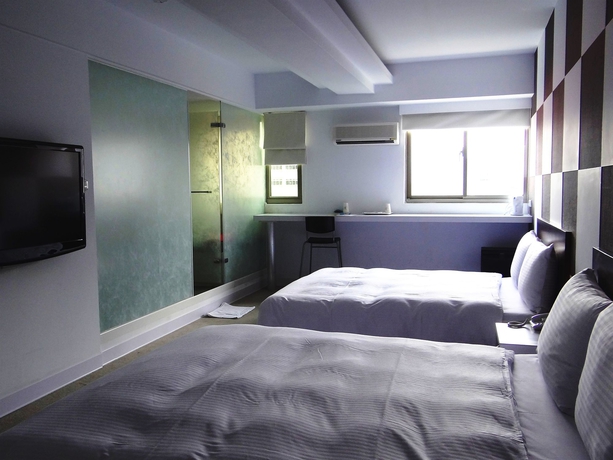 Imagen de la habitación del Hotel Ximen 135 house. Foto 4