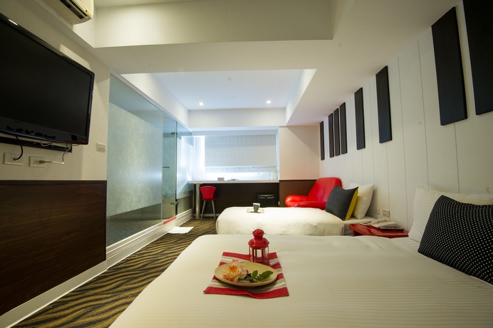 Imagen de la habitación del Hotel Ximen 135 house. Foto 9