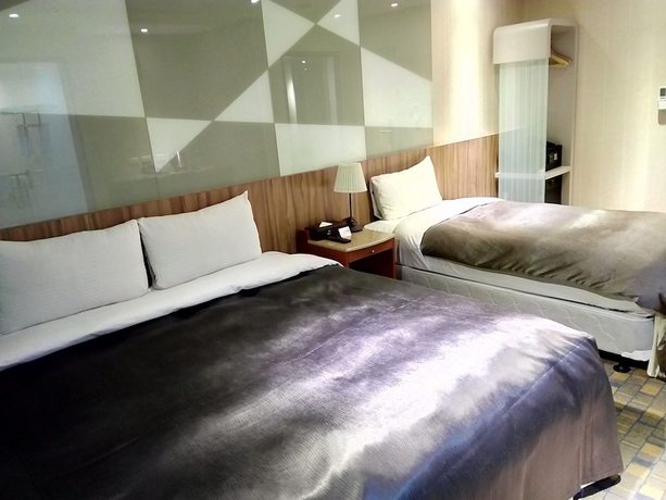 Imagen de la habitación del Hotel Ximen B. Foto 5