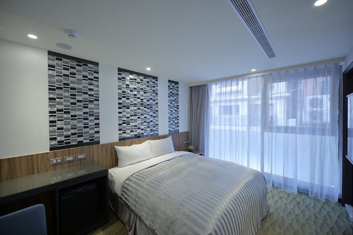 Imagen de la habitación del Hotel Ximen B. Foto 8