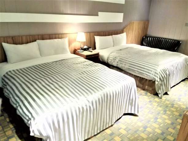 Imagen de la habitación del Hotel Ximen B. Foto 9