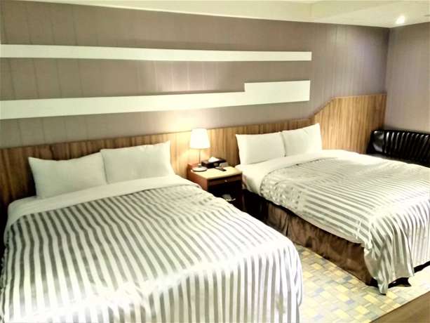 Imagen de la habitación del Hotel Ximen B. Foto 14