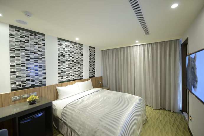 Imagen de la habitación del Hotel Ximen B. Foto 17