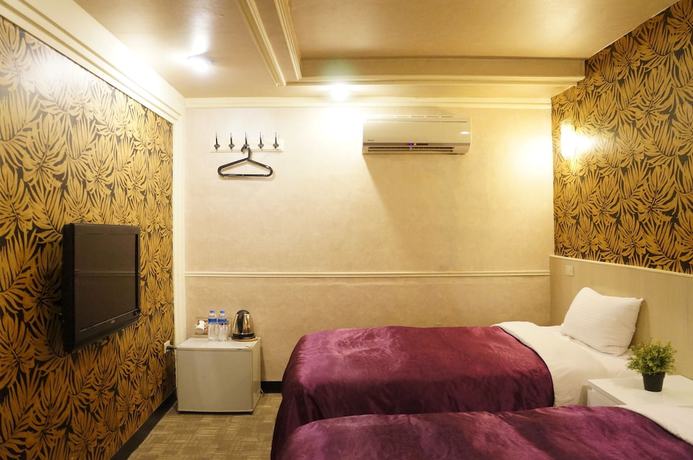 Imagen de la habitación del Hotel Ximen. Foto 2