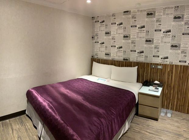 Imagen de la habitación del Hotel Ximen. Foto 3